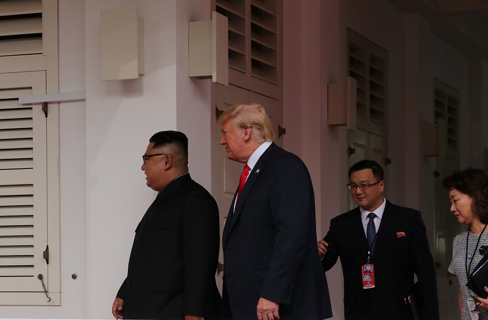 US President Donald Trump walks with North Korean leader Kim Jong-un at the Capella Hotel on Sentosa island in Singapore June 12, 2018. u00e2u20acu201d Reuters pic