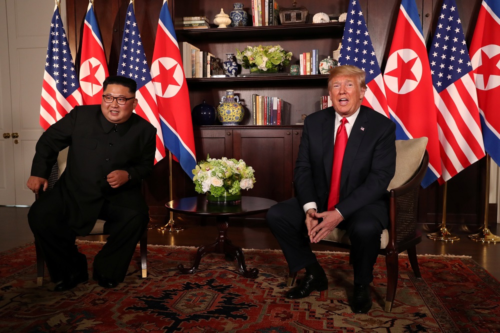 US President Donald Trump sits next to North Korea's leader Kim Jong-un before their bilateral meeting at the Capella Hotel on Sentosa island in Singapore June 12, 2018. u00e2u20acu201d Reuters pic