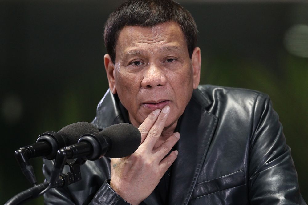 Philippine President Rodrigo Duterte gesturing as he gives his departure speech at the Manila International airport, June 2, 2018. u00e2u20acu201d AFP pic