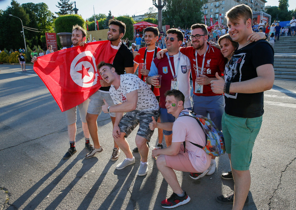 England's and Tunisia's fans pose at a Fan Fest zone in Vovgograd June 17, 2018 as both teams prepare for their World Cup Group G encounter. u00e2u20acu201d Reuters pic