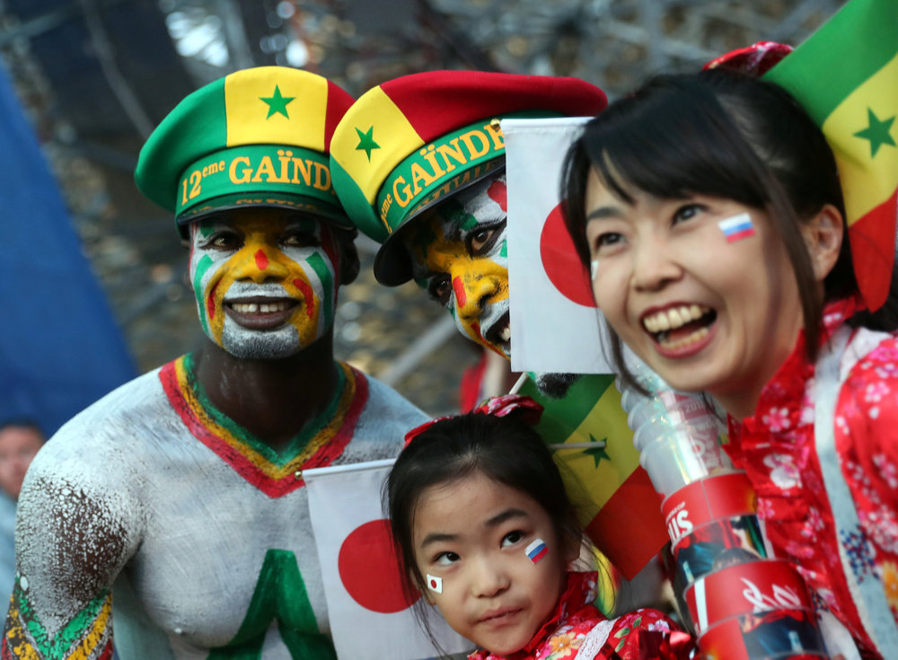 Fans of Japan and Senegal pose outside the stadium after the World Cup Group H match in Yekaterinburg June 24, 2018. u00e2u20acu201d Reuters pic