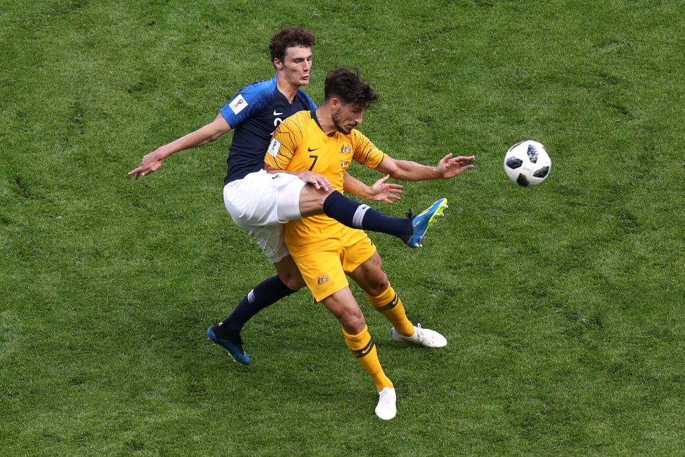 France's Benjamin Pavard in action with Australia's Mathew Leckie. u00e2u20acu201d Reuters pic