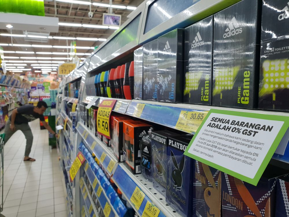 A notice announcing the zero-rated GST is displayed on the shelves of a supermarket in Kuala Lumpur June 1, 2018. u00e2u20acu201d Picture by Ahmad Zamzahuri 