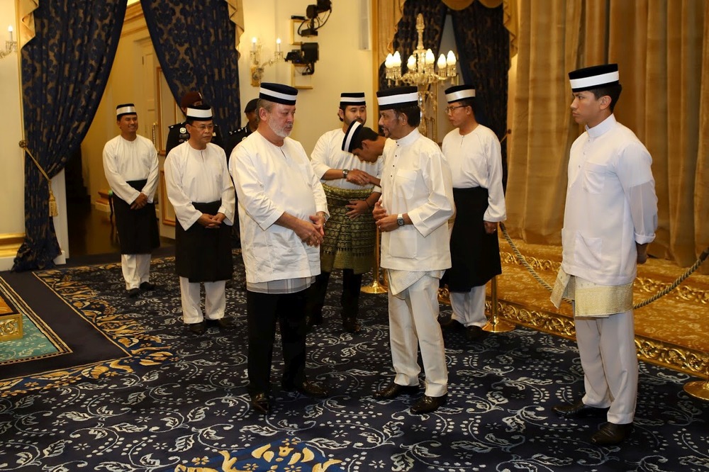 Sultan of Johor Sultan Ibrahim Sultan Iskandar receiving Sultan of Brunei Sultan Hassanal Bolkiah, who is paying his respects on the demise of the former’s mother, in Johor Baru June 6, 2018.