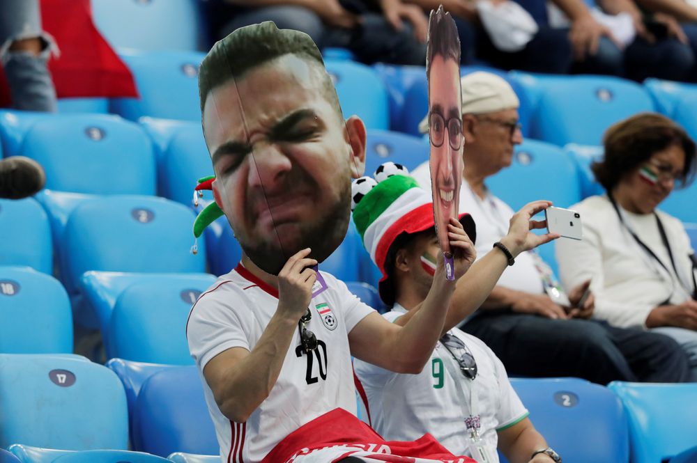 Iran fans inside the stadium hold up masks before the World Cup Group B match between Morocco and Iran in Saint Petersburg Stadium, Saint Petersburg, Russia, June 15, 2018. u00e2u20acu201d Reuters pic