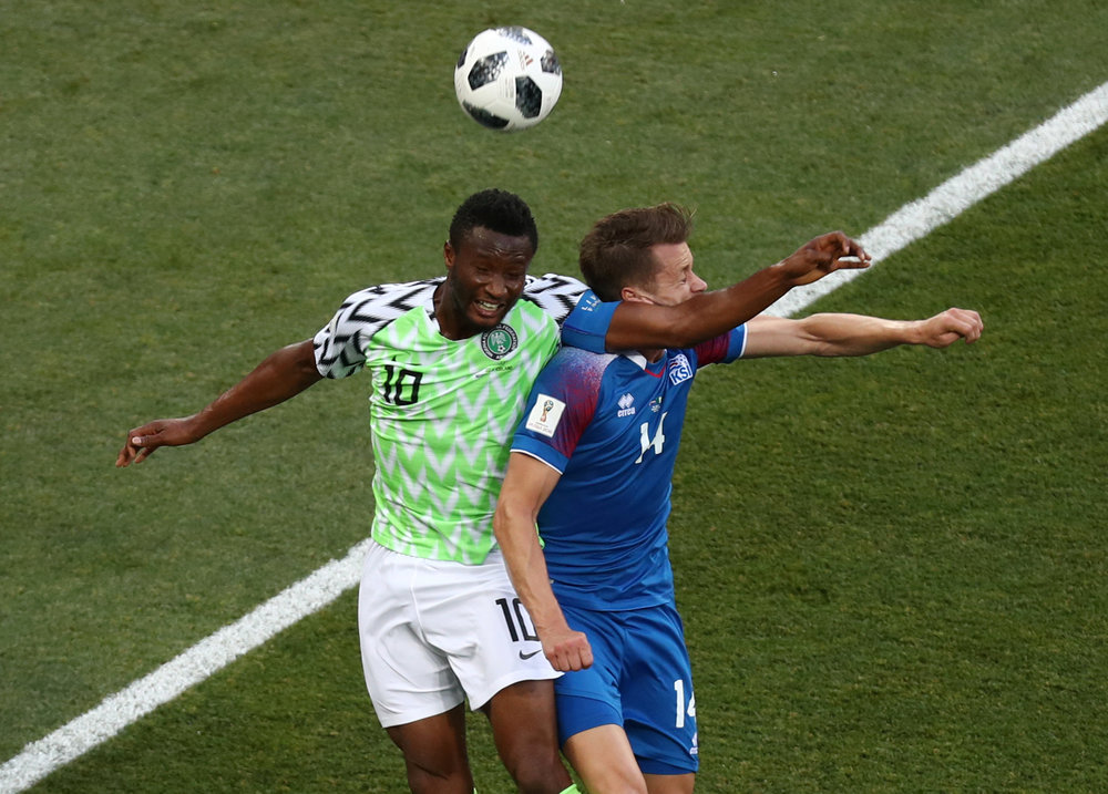 Nigeria's John Obi Mikel (left) in action with Iceland's Kari Arnason in a World Cup Group D match in Volgograd  June 22, 2018u00e2u20acu201d Reuters pic 