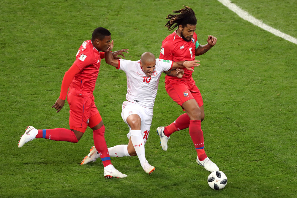 Tunisia's Wahbi Khazri (centre) in action with Panama's Harold Cummings and Roman Torres in the World Cup Group G match with Panama in Saransk June 28, 2018. u00e2u20acu201d Reuters picn