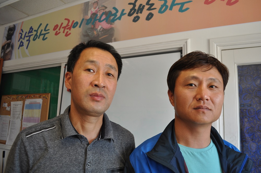 North Korean exiles Kim Song-ju (left) and Choi Joong Wha pose at the offices of a dissident newspaper in New Malden, southwest London on June 8, 2018. u00e2u20acu201d  AFP pic