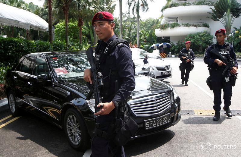 Policemen patrol the venue of the 13th International Institute for Strategic Studies Asia Security Summit: The Shangri-La Dialogue, in Singapore May 30, 2014. u00e2u20acu201d Reuters pic