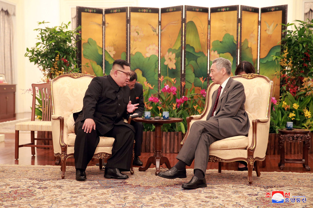 North Korea's leader Kim Jong-un speaks with Singapore's Prime Minister Lee Hsien Loong at the Istana in Singapore June 10, 2018.  u00e2u20acu201d Reuters pic