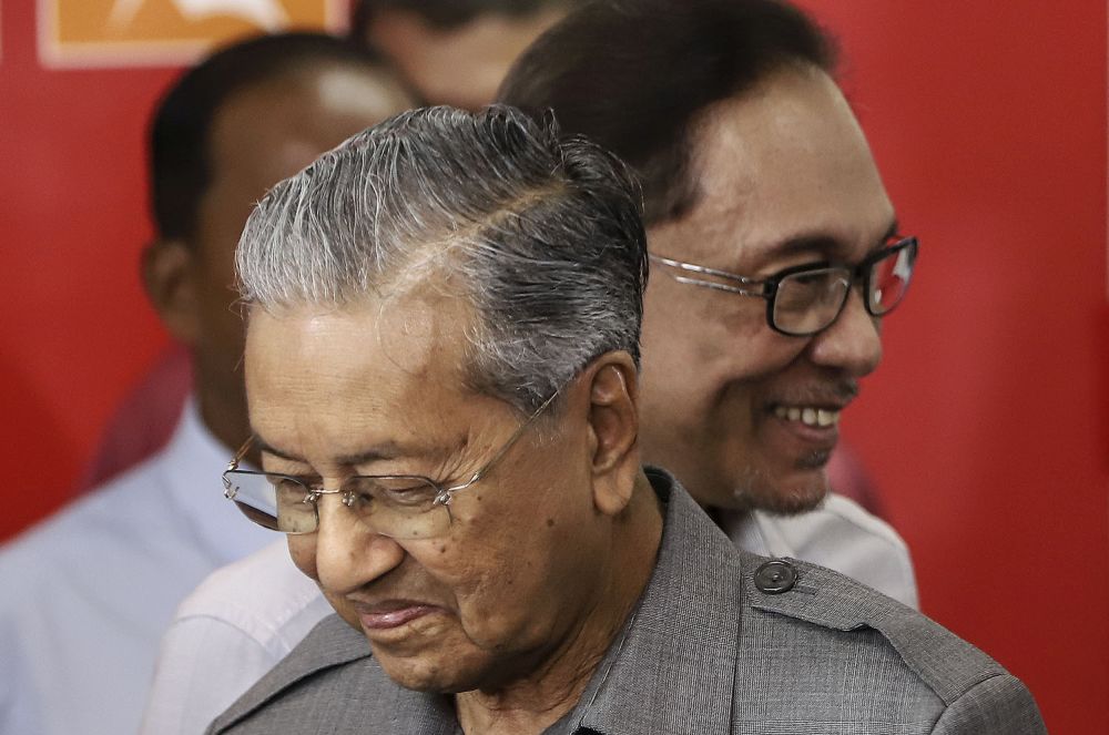 Tun Dr Mahathir Mohamad is pictured with Datuk Seri Anwar Ibrahim at Menara Yayasan Selangor on June 1, 2018. — Picture by Azneal Ishak