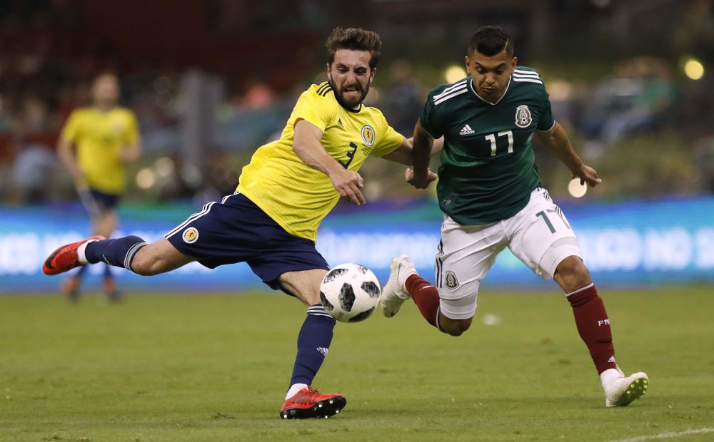Mexicou00e2u20acu2122s Jesus Corona in action with Scotlandu00e2u20acu2122s Graeme Shinnie during their international friendly at Estadio Azteca, Mexico City, June 2, 2018. u00e2u20acu201d Reuters pic