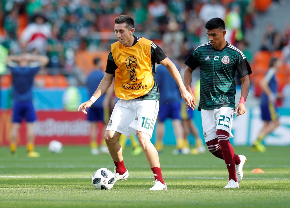 Mexico's Hector Herrera and Jesus Gallardo during the warm up ahead of the clash against Sweden, June 27, 2018. u00e2u20acu2022 Reuters pic