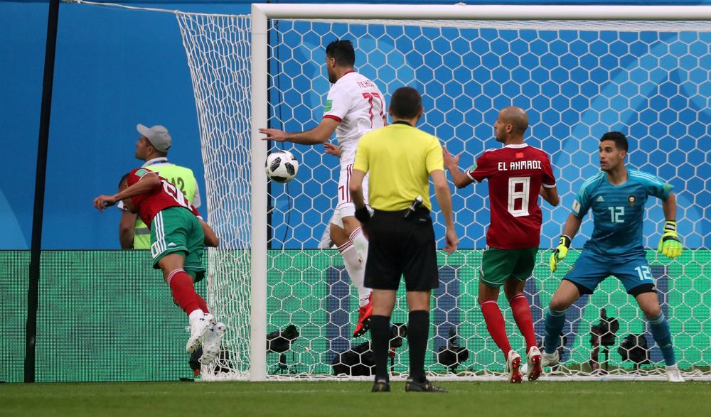 Moroccou00e2u20acu2122s Aziz Bouhaddouz scores an own goal and the first goal for Iran during their World Cup Group B match in Saint Petersburg Stadium, Saint Petersburg, Russia u00e2u20acu201c June 15, 2018. u00e2u20acu201d Reuters pic