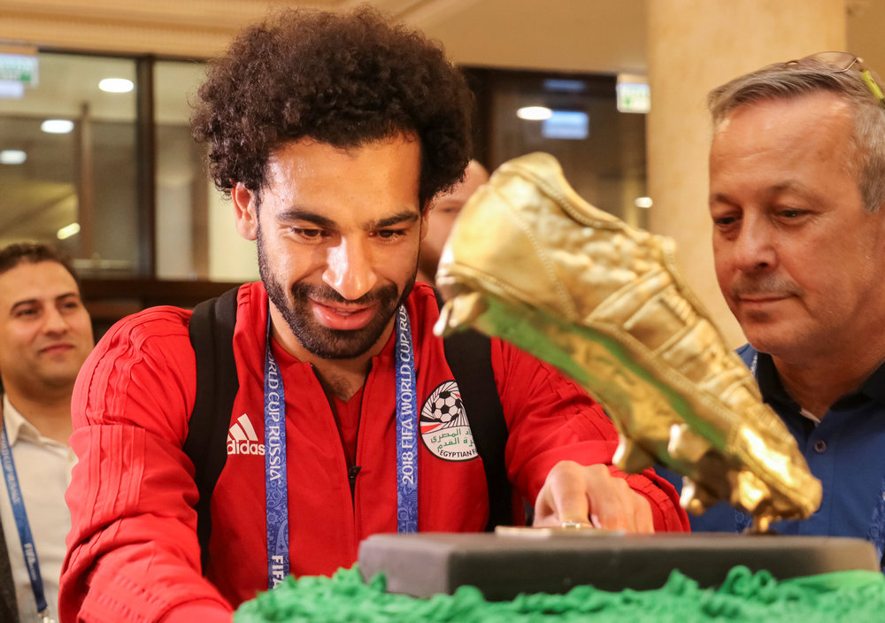 Egypt's Mohamed Salah receives a cake, weighing 100 kg and decorated with a golden football boot, as a birthday present in the Chechen capital Grozny, Russia June 16, 2018. u00e2u20acu201d Reuters pic