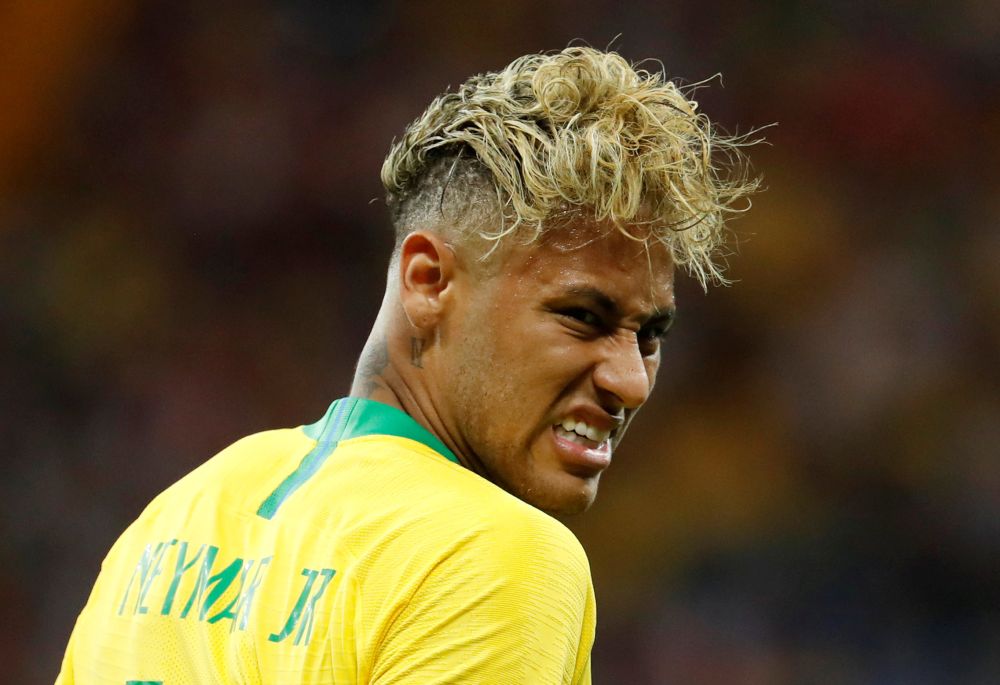 Neymaru00e2u20acu2122s hairdo featured shaved sides and a blond-dyed mop at the front was unmissable during Brazil's 1-1 World Cup opener against Switzerland on Sunday. u00e2u20acu2022 Reuters pic