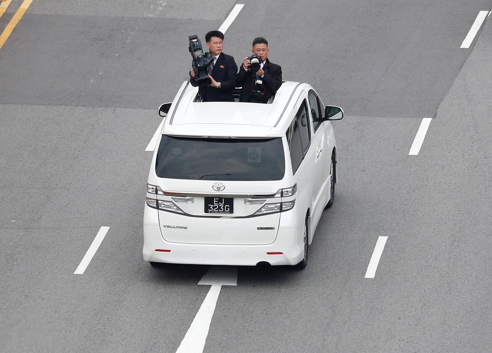 North Korean media travel with the motorcade of North Korean leader Kim Jong Un towards Sentosa for his meeting with US President Donald Trump, in Singapore June 12, 2018. u00e2u20acu201d Reuters pic