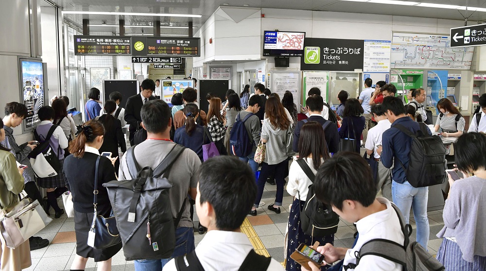 Passengers are seen at Nijyo station in Kyoto, western Japan after train services were suspended because of an earthquake, in this photo taken by Kyodo June 18, 2018. u00e2u20acu201d Reuters pic