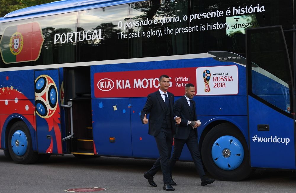 Portugalu00e2u20acu2122s forward Cristiano Ronaldo gestures a thumbs up while walking with Ricardo Quaresma upon the teamu00e2u20acu2122s arrival at their base camp in Kratovo, outskirts of Moscow, on June 9, 2018, ahead of the Russia 2018 World Cup. u00e2u20acu201d AFP pic