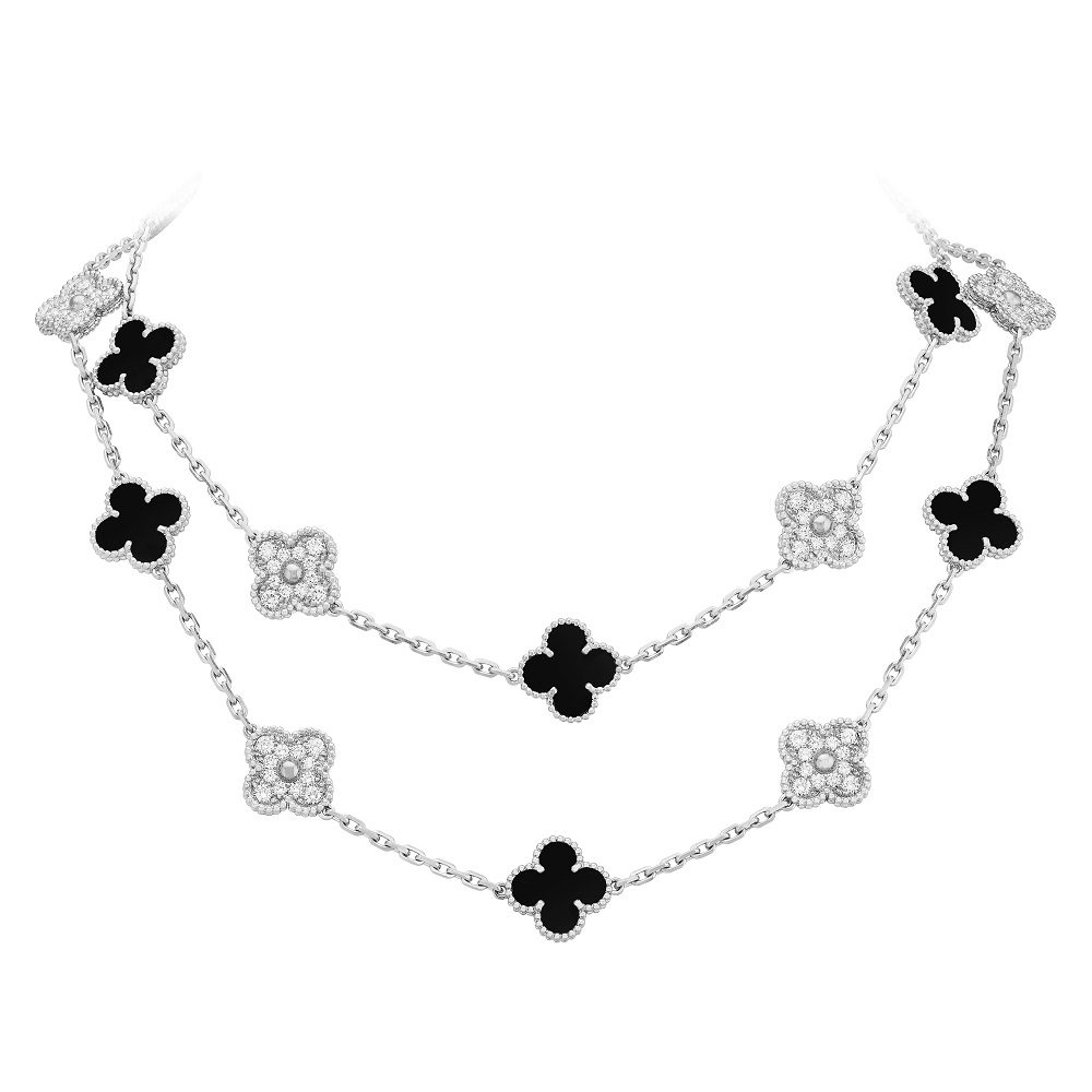 Vintage Alhambra long necklace, 20 motifs, in white gold, onyx and diamonds, by Van Cleef & Arpels.