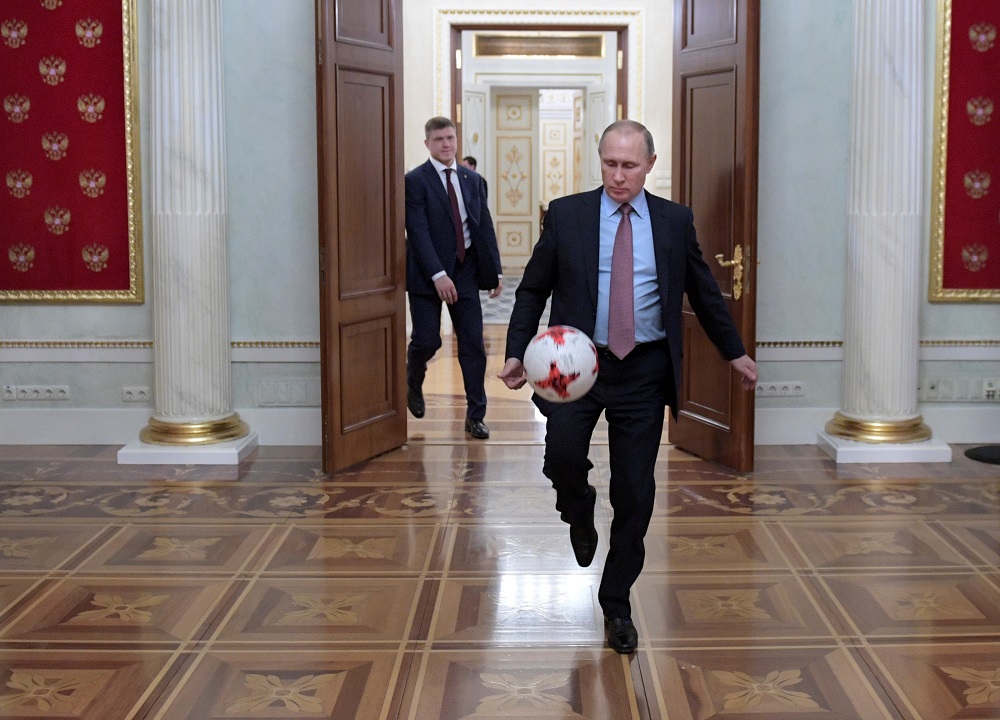 Russian President Vladimir Putin plays with a ball following a meeting with Fifa president Gianni Infantino at the Kremlin in Moscow, November 25, 2016. u00e2u20acu201d Reuters pic