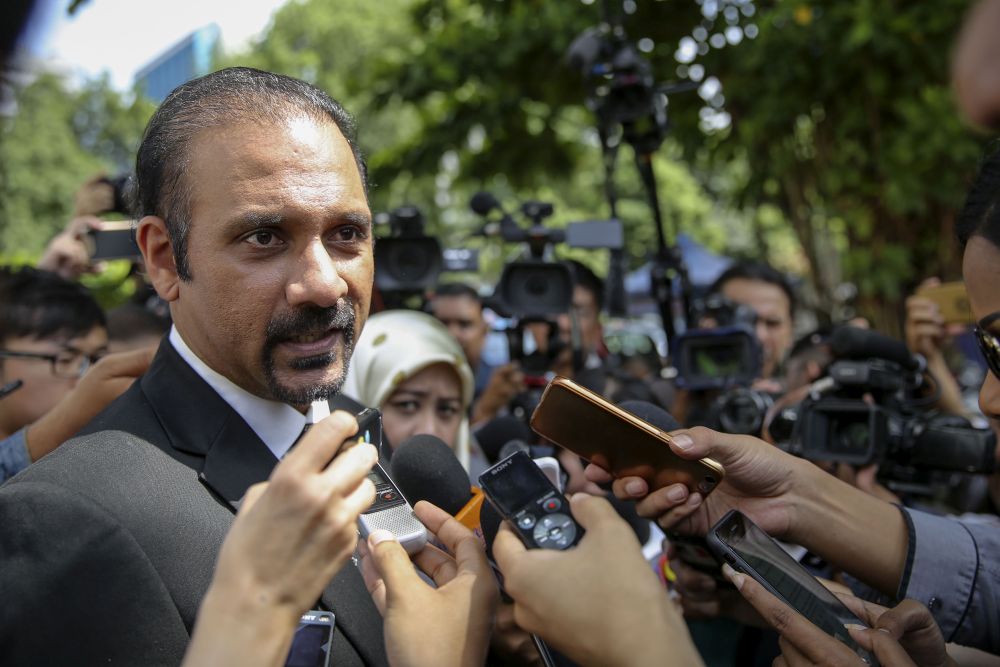 Ramkarpal Singh speaks to reporters outside the Dang Wangi police station in Kuala Lumpur on June 20, 2018. u00e2u20acu201d Picture by Yusof Mat Isa