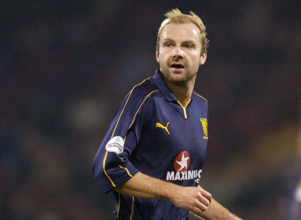 Hakan Mild playing at Wimbledon in this file picture taken on November 20, 2001. u00e2u20acu201d Picture by Action Images/Tony O'Brien/Reuters