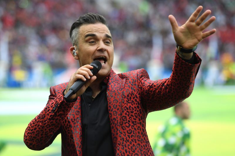 Williams was performing in front of 80,000 people at the stadium, and a global television audience of tens of millions. u00e2u20acu2022 AFP pic