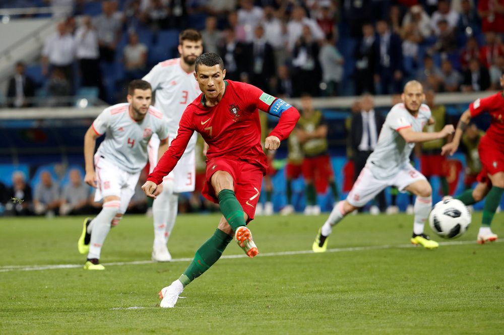Portugalu00e2u20acu2122s Cristiano Ronaldo scores their first goal from the penalty spot against Spain during their World Cup Group B match at Fisht Stadium, Sochi, Russia, June 15, 2018. u00e2u20acu201d Reuters pic