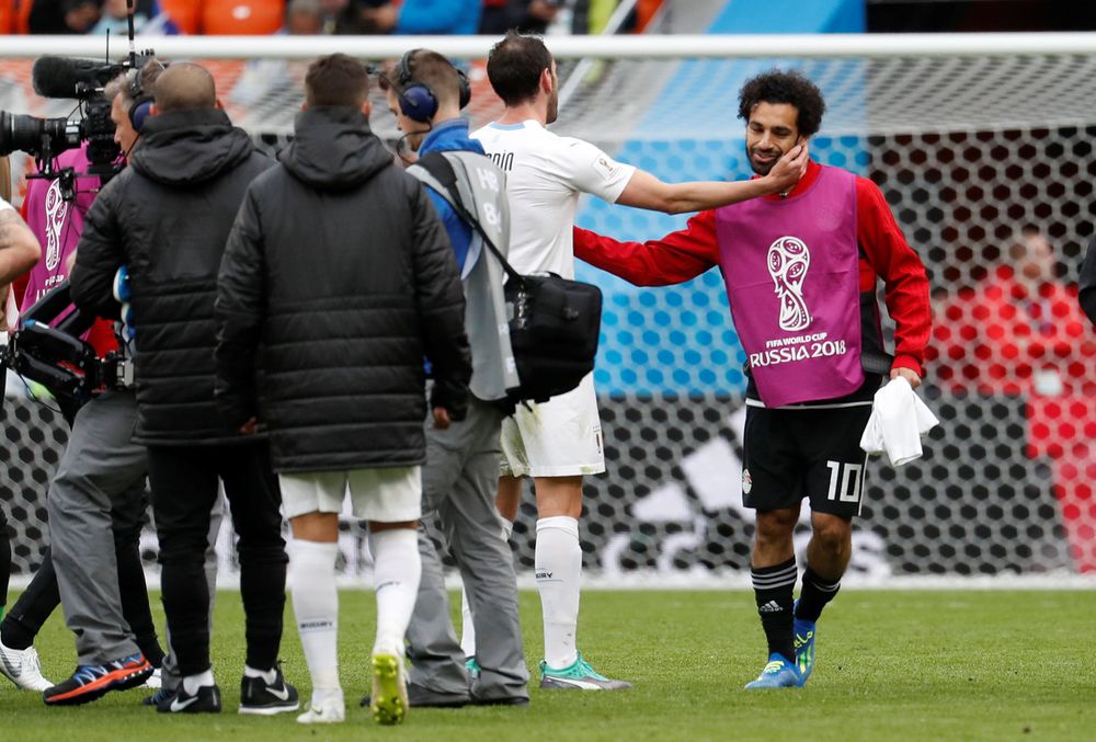 Egyptu00e2u20acu2122s Mohamed Salah with Uruguayu00e2u20acu2122s Diego Godin after the World Cup 2018 Group A Egypt vs Uruguay match in Ekaterinburg Arena, Yekaterinburg, Russia, June 15, 2018. u00e2u20acu201d Reuters pic