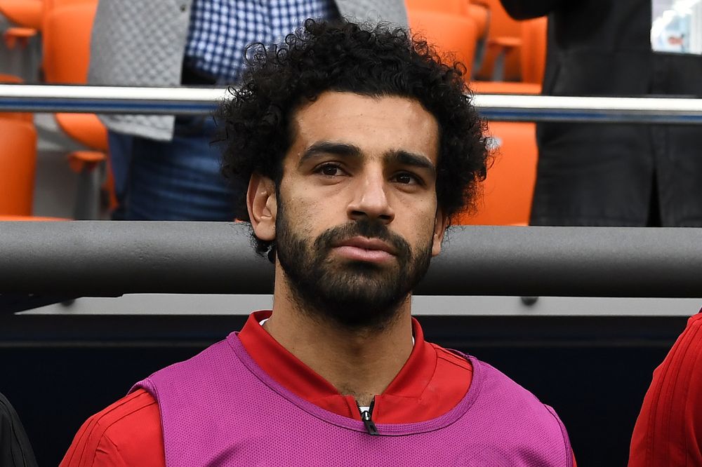 Egyptu00e2u20acu2122s forward Mohamed Salah is seen by the substitutes bench before kick-off of the Russia 2018 World Cup Group A football match between Egypt and Uruguay at the Ekaterinburg Arena in Ekaterinburg on June 15, 2018. u00e2u20acu201d AFP pic