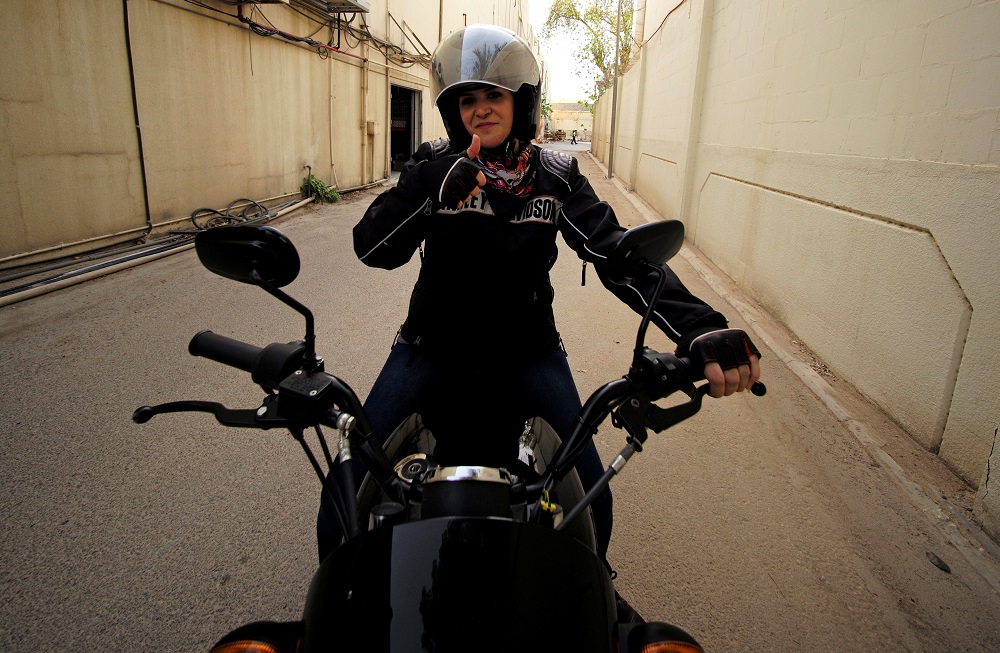 Saudi Doaa Bassem gives thumbs up as she conducts her advance motorcycle-riding training at Harley Davidson dealer in Al Khobar, Saudi Arabia, June 9, 2018. u00e2u20acu201d Reuters pic