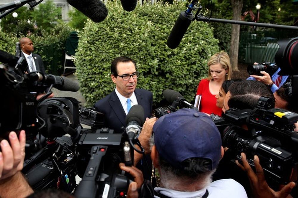 US Treasury Secretary Steve Mnuchin speaks with reporters as he departs the North Lawn after speaking live with Fox and Friends TV from the White House in Washington June 27, 2018. u00e2u20acu2022 Reuters pic
