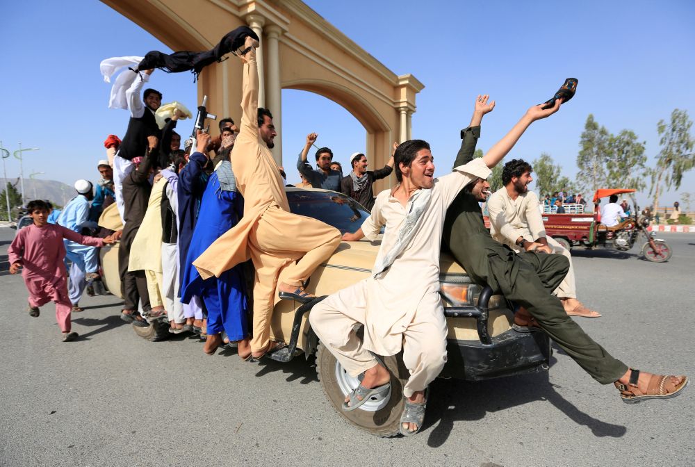 People celebrate ceasefire in Rodat district of Nangarhar province, Afghanistan June 16, 2018. u00e2u20acu201d Reuters pic