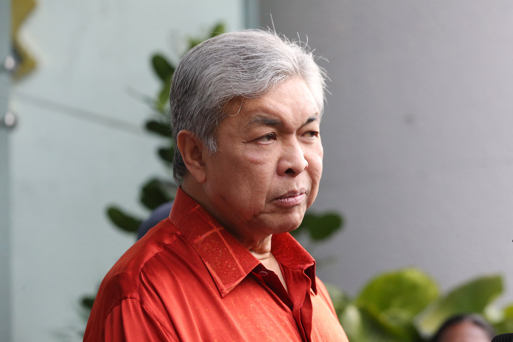 Former deputy prime minister Datuk Seri Ahmad Zahid Hamidi speaks to the media after leaving the MACC headquarters in Putrajaya July 2, 2018. u00e2u20acu201d Picture by Azinuddin Ghazali