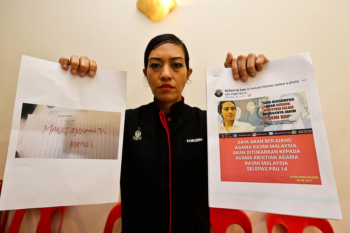 Seri Delima Assemblywoman Syerleena Rashid showing the newly received death threat at Seri Delima Service Centre July 11, 2018. u00e2u20acu201d Picture by Sayuti Zainudin 