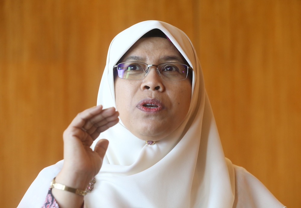 Political Secretary for the Ministry of Women, Family & Community Development Rodziah Ismail speaks to the media during a press conference in Putrajaya July 11, 2018. u00e2u20acu201dPicture by Zuraneeza Zulkifli