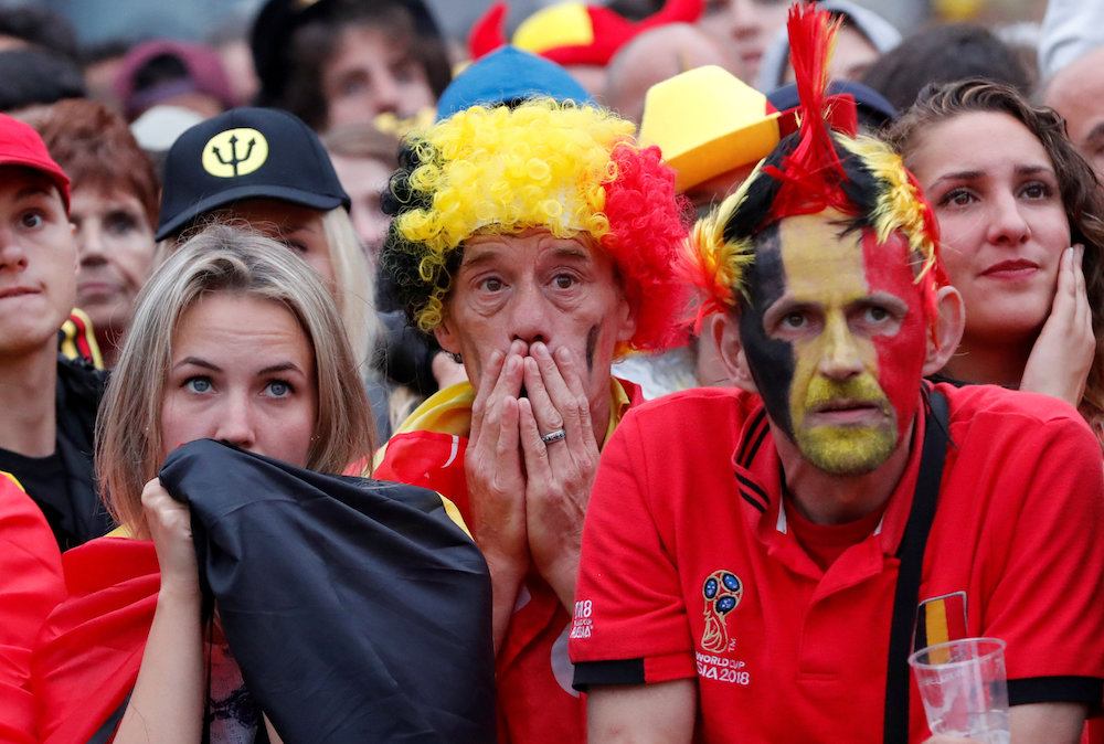 Belgium fans react as they watch the broadcast of the World Cup semi-final match between France and Belgium in the fan zone in Brussels July 11, 2018. u00e2u20acu201d Reuters pic 