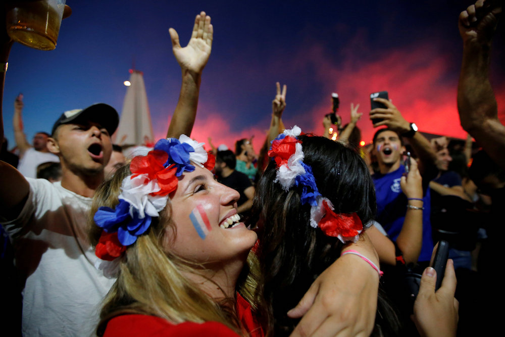 France fans react after defeating Belgium in their World Cup semi-final match, Marseilla July 11, 2018. u00e2u20acu201d Reuters pic