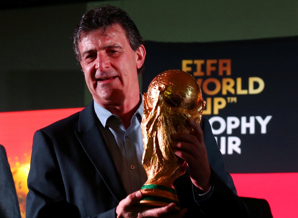 Mario Kempes, former Argentine national football player and member of the 1978 world champion team, holds the Fifa football World Cup trophy in Buenos Aires March 29, 2018. u00e2u20acu201d Reuters pic