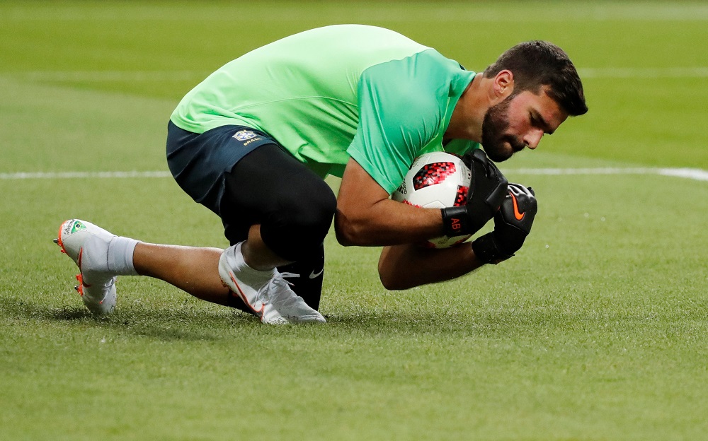Brazilu00e2u20acu2122s Alisson during warm up ahead of the World Cup quarter final match against Belgium at the Kazan Arena in Russia July 6, 2018. u00e2u20acu201d Reuters pic