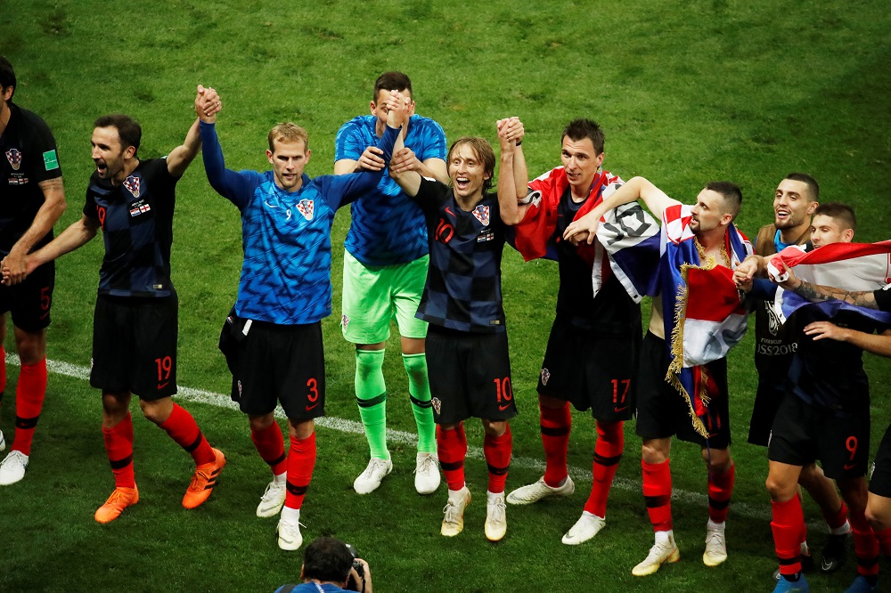 Croatiau00e2u20acu2122s Luka Modric, Mario Mandzukic and team mates celebrate after the match against England at the Luzhniki Stadium in Moscow July 11, 2018. u00e2u20acu201d Reuters pic