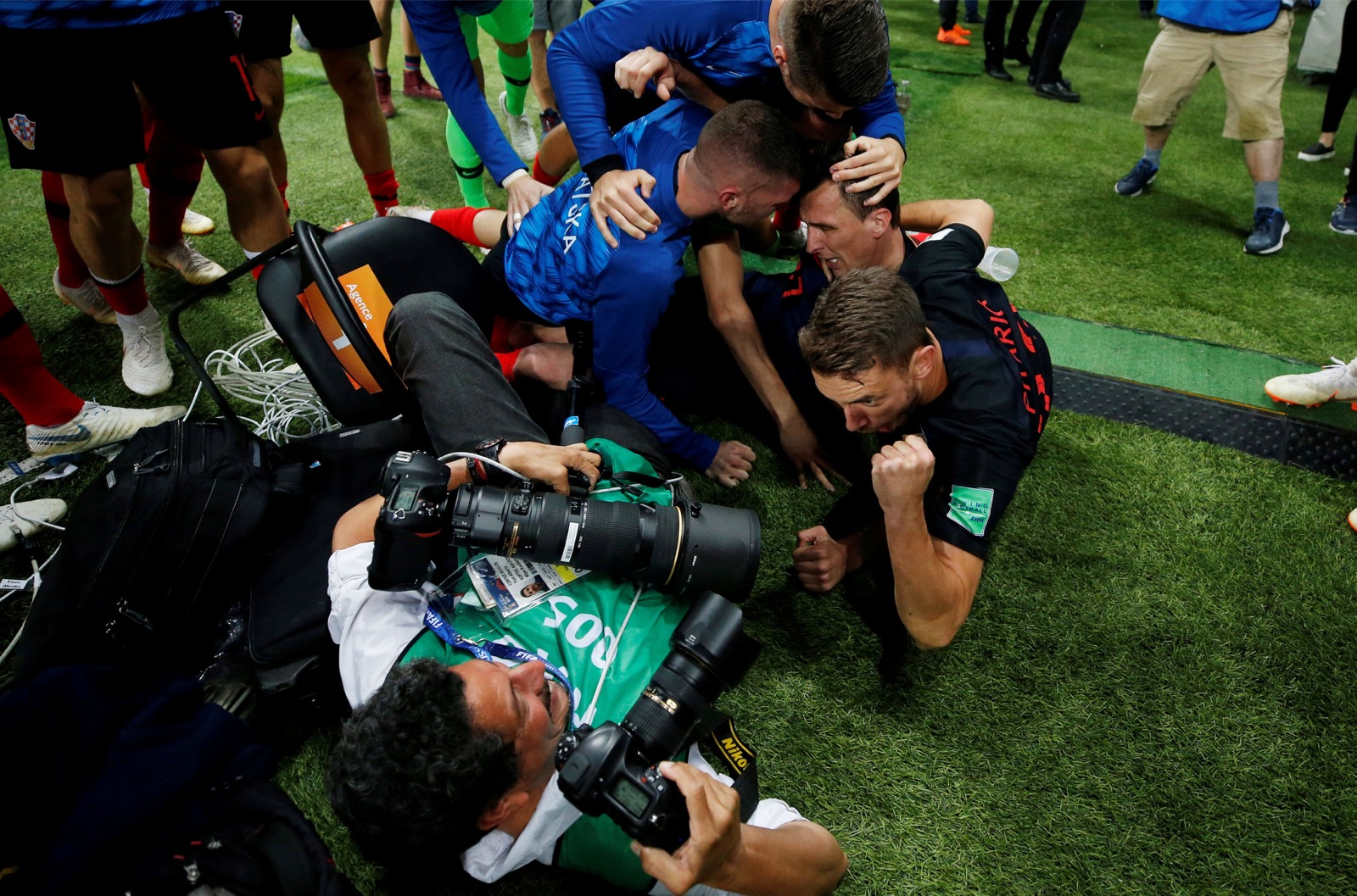 Croatia players celebrate next to an AFP photographer Yuri Cortez after Mario Mandzukic scores their second goal  at the Luzhniki Stadium in Moscow July 11, 2018. u00e2u20acu201d Reuters pic