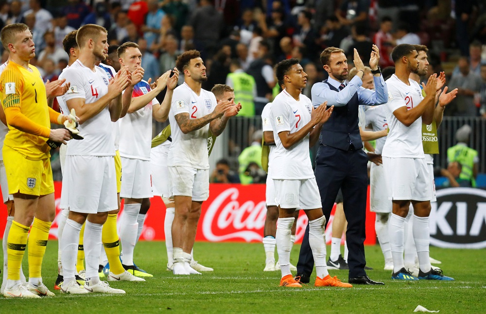 England manager Gareth Southgate and his players applaud fans after the semi-final match against Croatia in Moscow, July 12, 2018. u00e2u20acu201d Reuters pic 