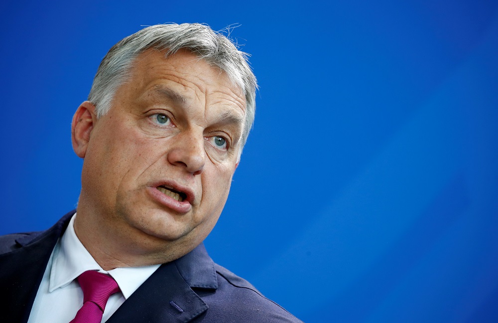 Hungarian Prime Minister Viktor Orban talks to the media after a meeting with German Chancellor Angela Merkel in Berlin July 5, 2018. u00e2u20acu201d Reuters pic