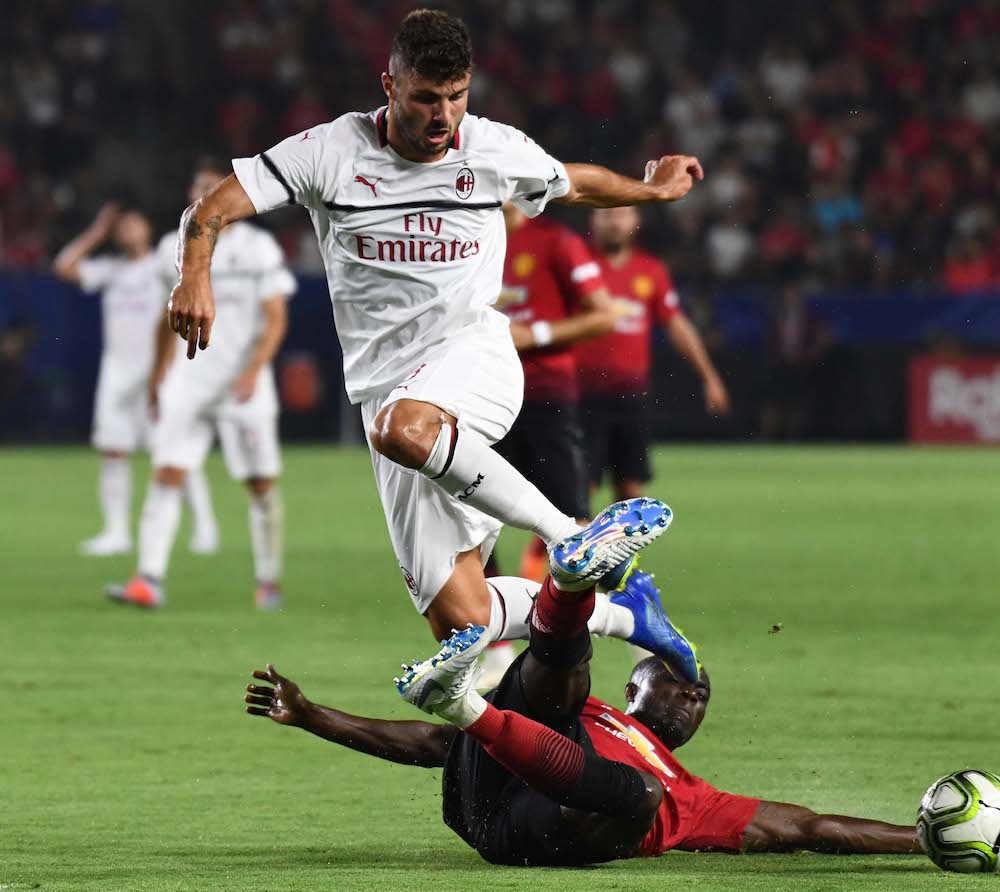 AC Milanu00e2u20acu2122s Patrick Cutrone and Manchester Unitedu00e2u20acu2122s Eric Bailly collide during an International Champions Cup match in Carson City, California July 25, 2108. u00e2u20acu201d Robert Hanashiro-USA TODAY Sports pic via Reuters