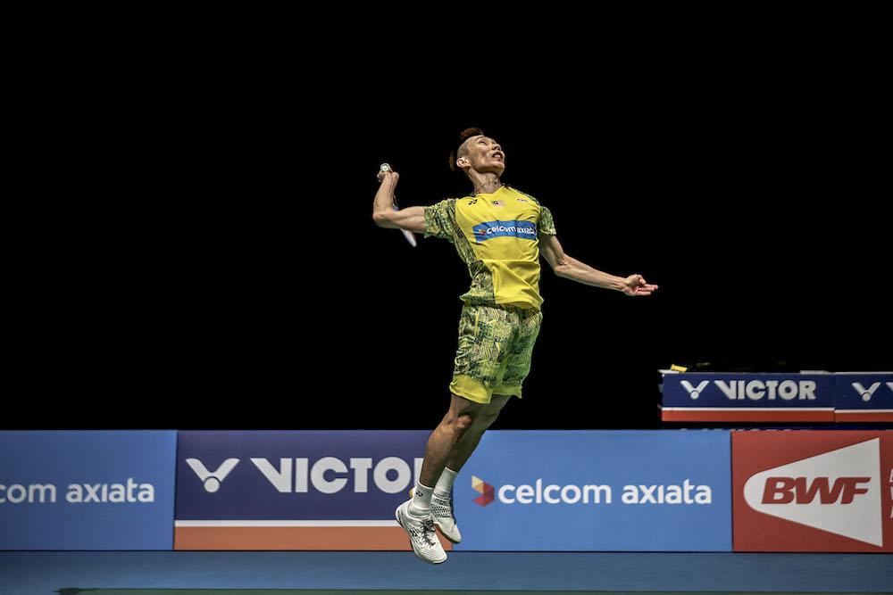 Datuk Lee Chong Wei in action against Japan's Kento Momota in the finals of the Malaysia Open Badminton Championship 2018 at Axiata Stadium, July 1, 2018. u00e2u20acu201d Picture by Hari Anggara.