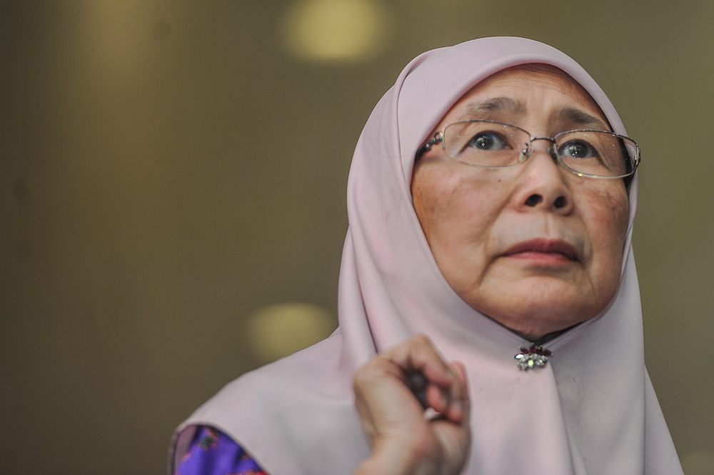 Minister of Women and Family Development (KPWKM), Datuk Seri Dr Wan Azizah Wan Ismail speaks to media during a press conference at the Ministry of Women and Family Development in Putrajaya July 2, 2018. u00e2u20acu201d Picture by Shafwan Zaidon