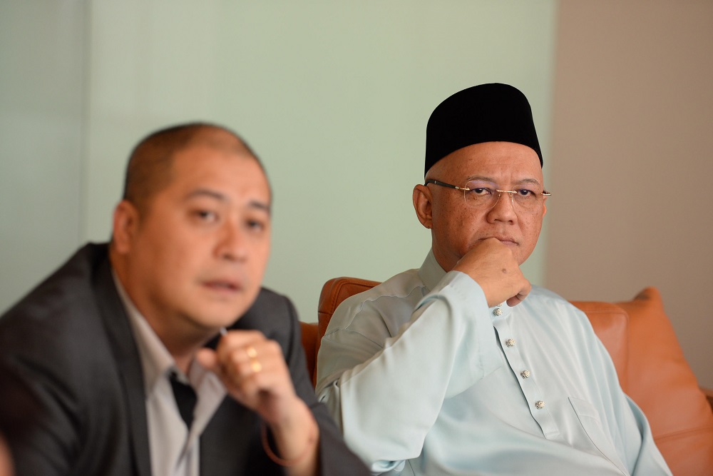 Consortium Zenith Construction Sdn Bhd senior executive director Datuk Zarul Ahmad Mohd Zulkifli (right). u00e2u20acu201d Picture by KE Ooi