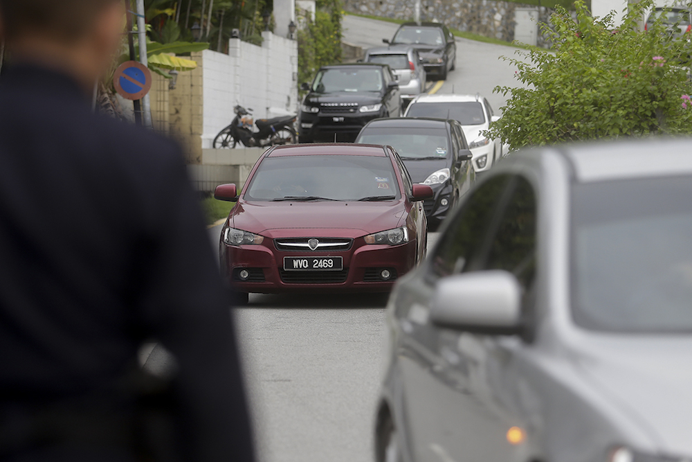 An MACC car believed to be ferrying Datuk Seri Najib Razak leaves his residence on Jalan Langgak Duta in Kuala Lumpur July 3, 2018. u00e2u20acu201d Picture by Mukhriz Hazim